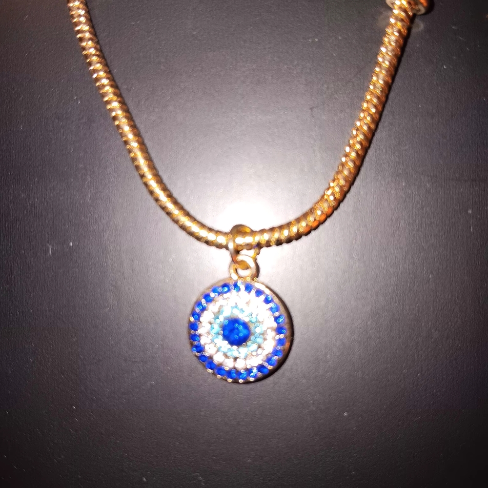 Elegant Gold Necklace with Blue and Silver Evil Eye Pendant
